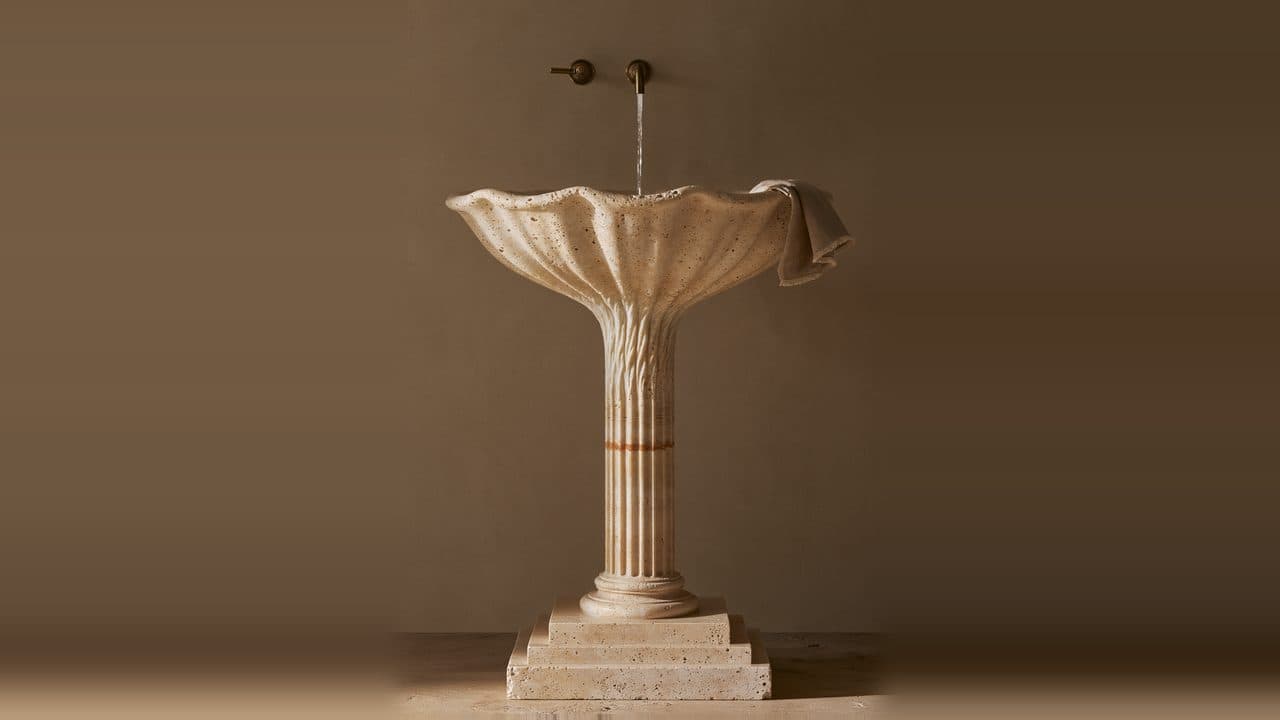 The Fountain Column: Hand-carved Roman travertine pedestal vessel sink · 36" H × 18" D