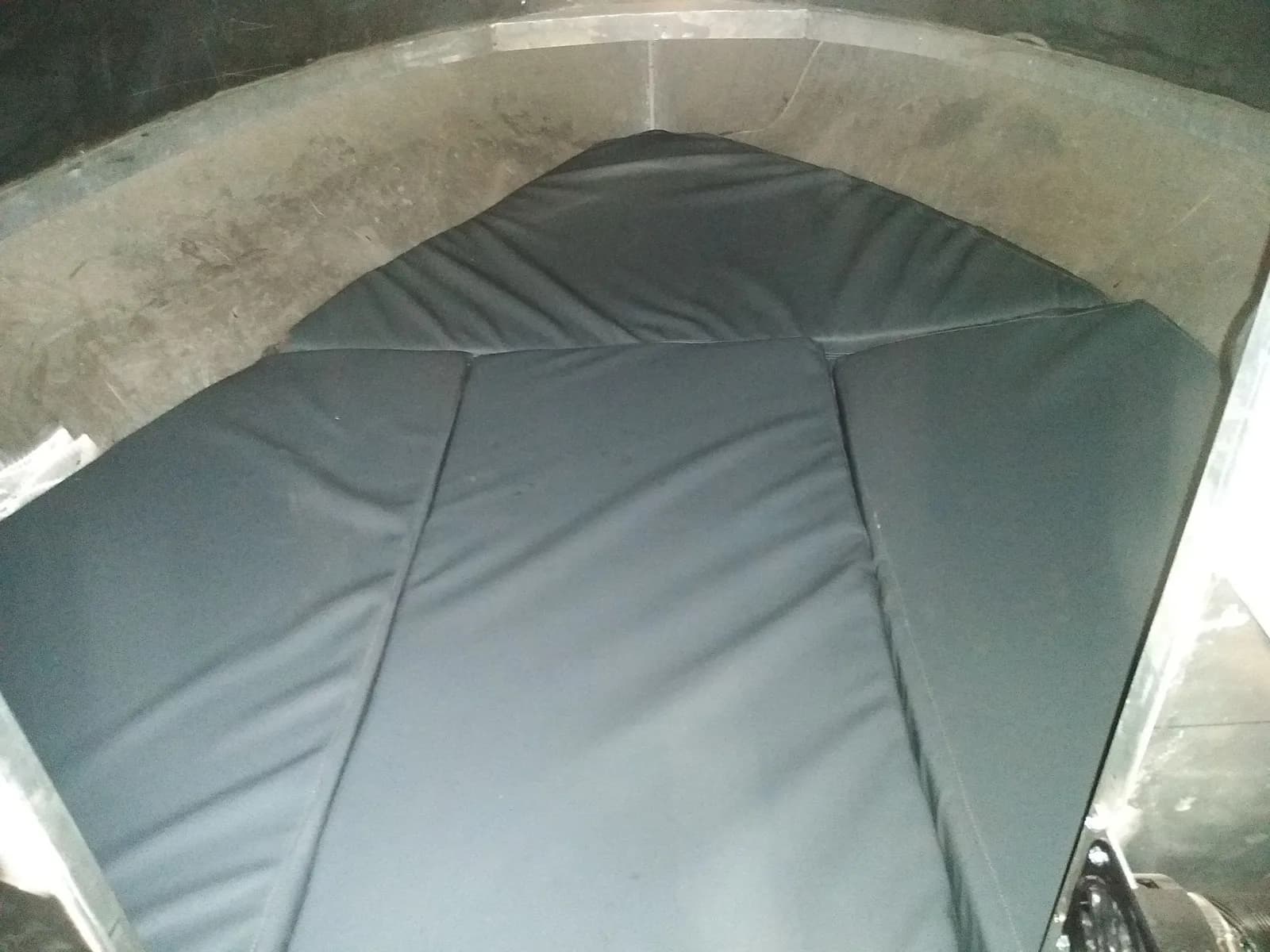 Grey cushions fitted to a boat bow, by Matsu Upholstery