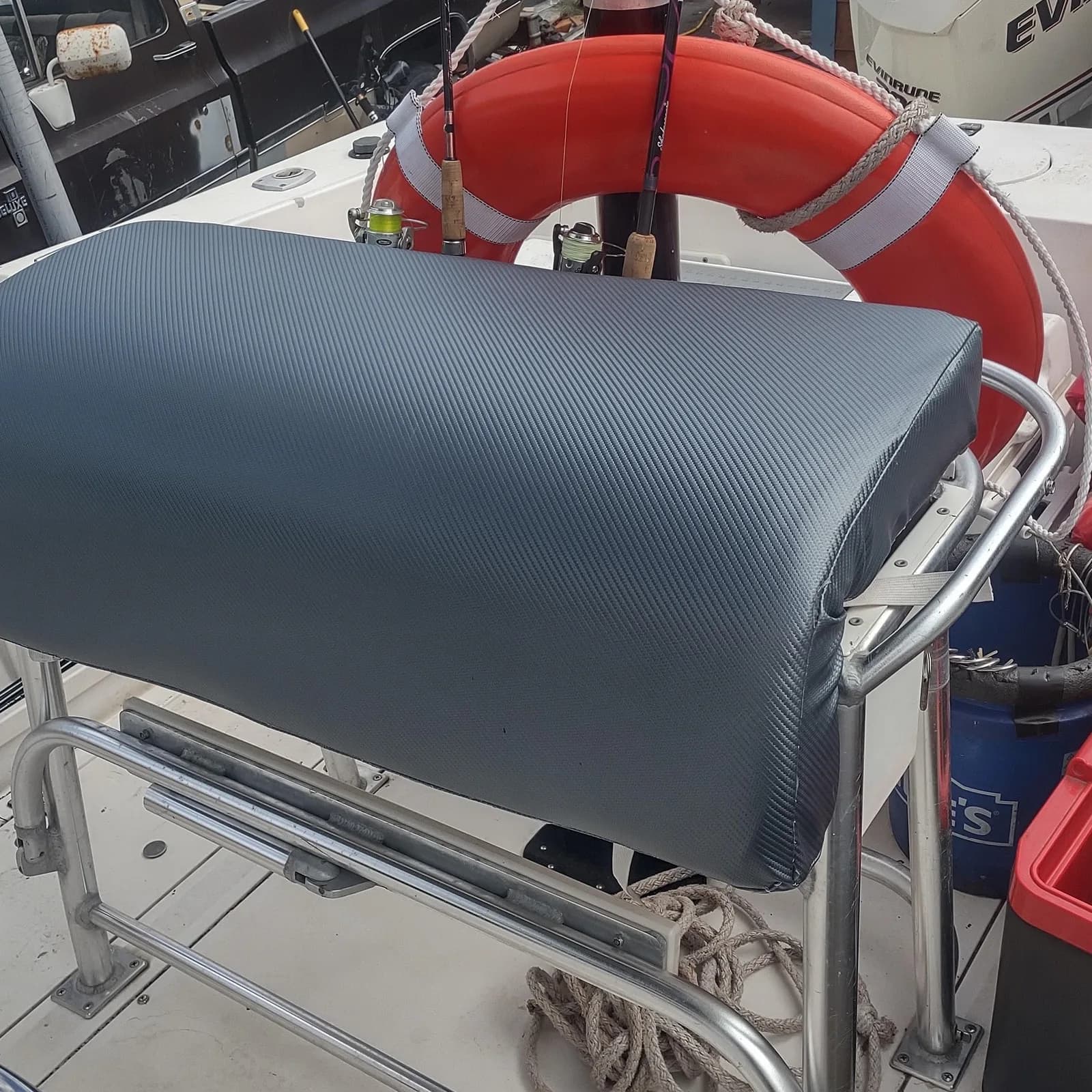 Grey boat helm seat cushion, by Matsu Upholstery