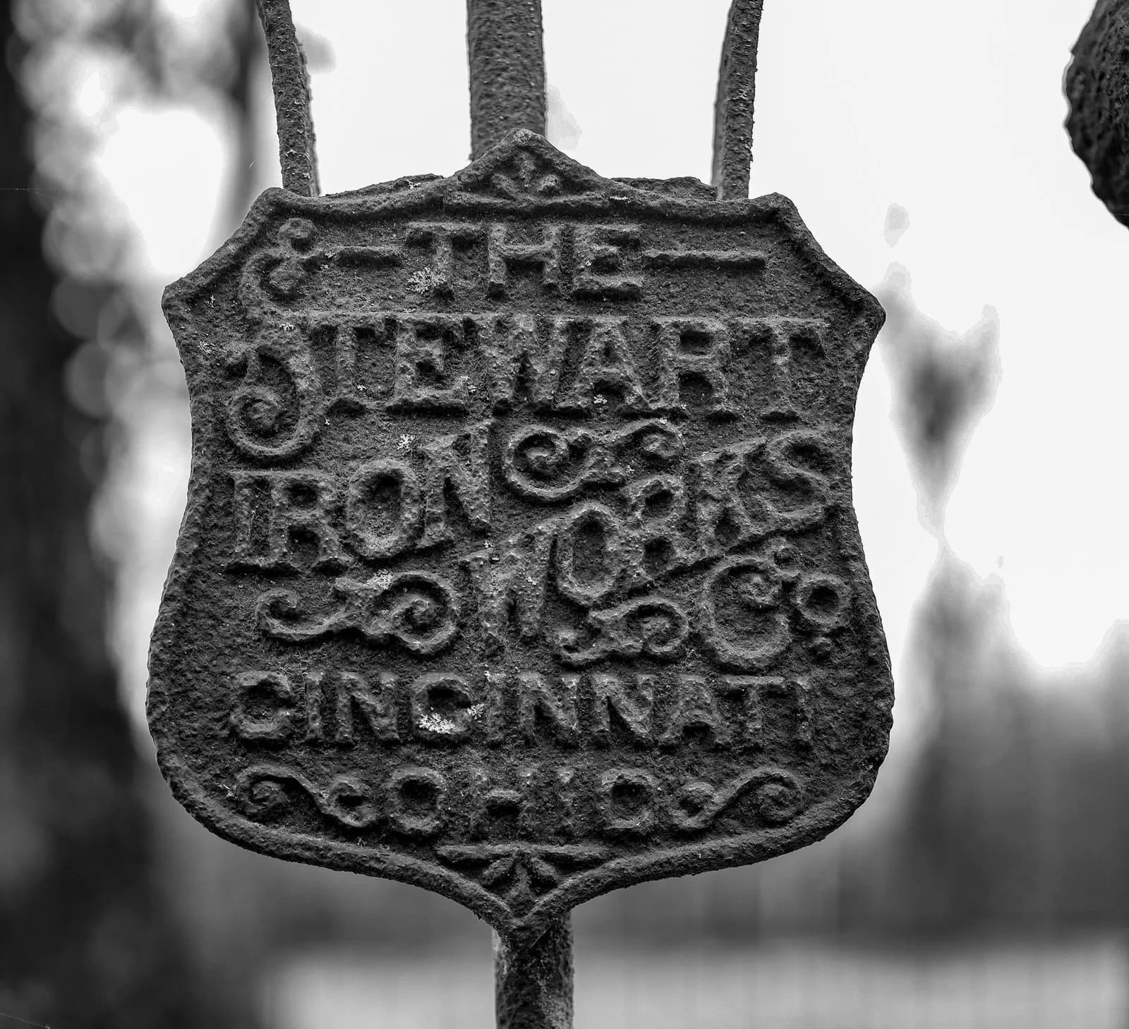 Cast Stewart Shield reading "The Stewart Iron Works Co., Cincinnati, Ohio"