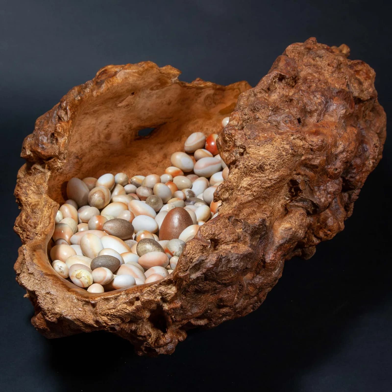 Nest IX: cherry burl holding wood-fired porcelain eggs, by Siem van der Ven