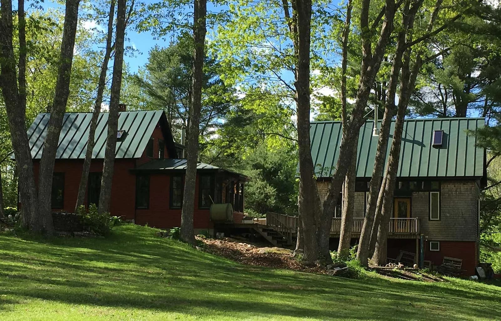 The van der Ven studio among the trees in Lincolnville Center, Maine